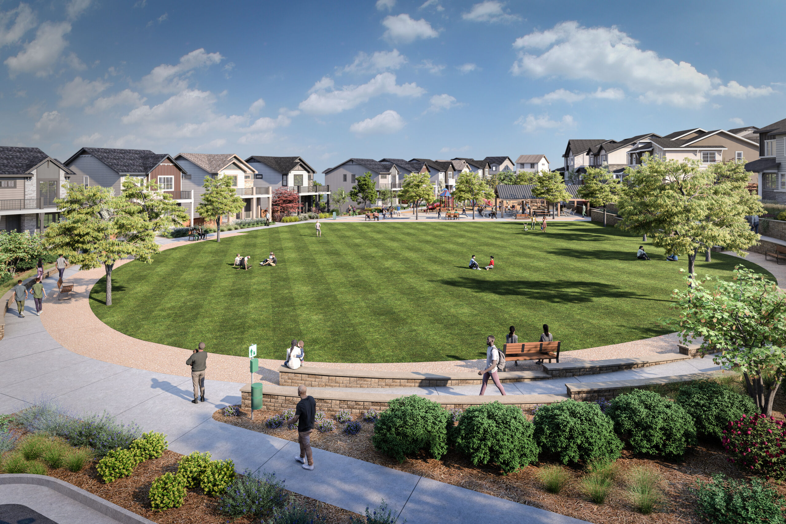 A large, grassy park surrounded by houses—including Uplands Westminster homes for sale—with people sitting, walking, and relaxing on a sunny day.