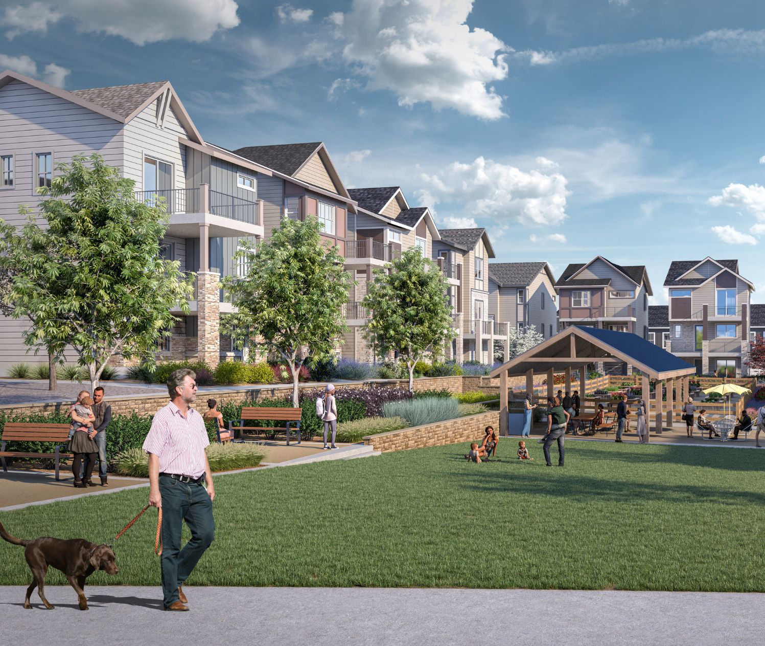 A man walks a dog in a landscaped park area near modern Uplands Westminster apartment buildings, with people sitting on benches and gathering under a pavilion.